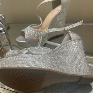 Beautiful sparkly heels. Barely worn silver wedges